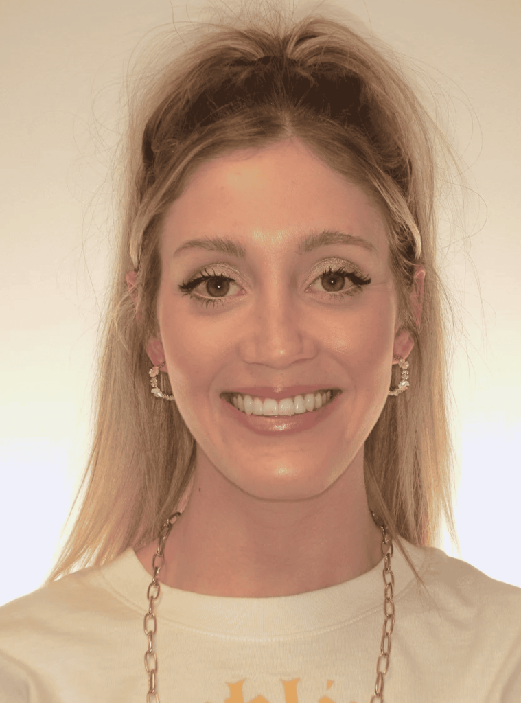 smiling-woman-with-healthy-skin-at-living-loved-wellness